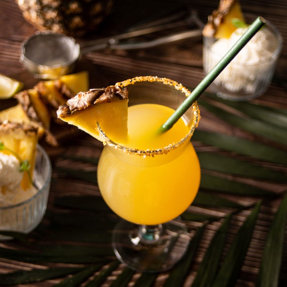 Glass containing a rum cocktail